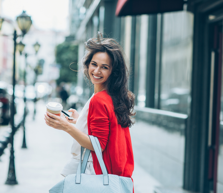 Woman walking happy - benefits of coaching